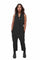 woman wearing a black utility jumpsuit from Ekoluxe